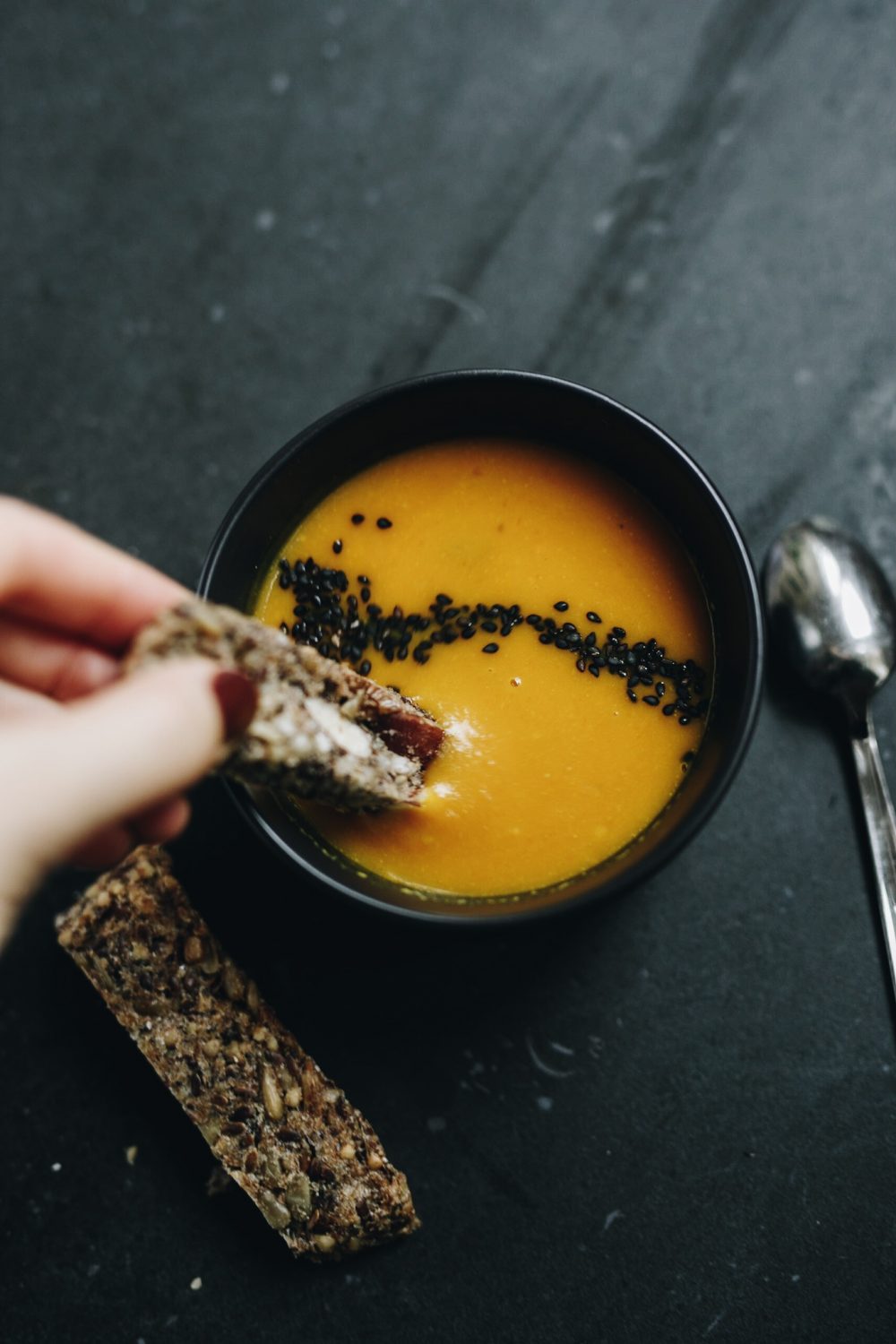 NZFW The Sarah Project x Salasai : Ginger and pumpkin soup with a roasted black sesame seed crackers
